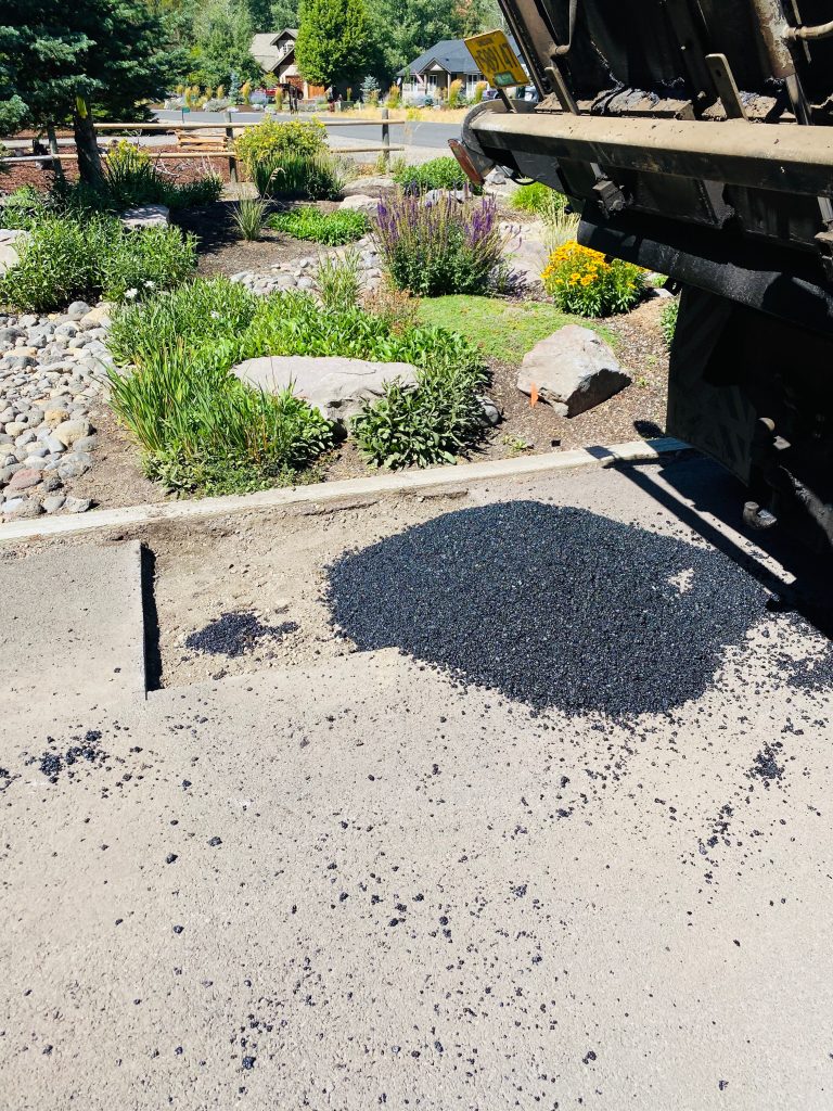 Pouring Cold Patch Asphalt